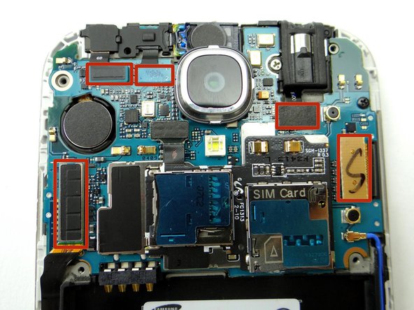 Picture 1: Using the Blue Pry Tool, disconnect five cable connectors on the logic board.