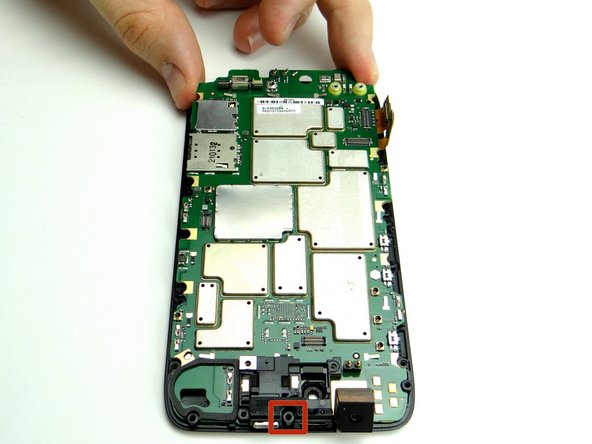 Seat the logic board on the display assembly: