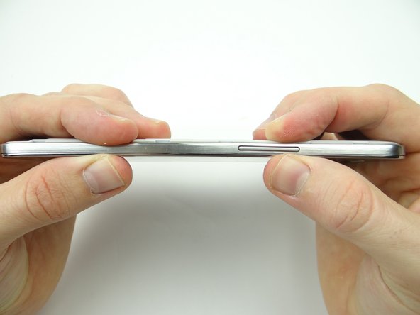 Check the perimeter to ensure the mid-frame is fully seated.