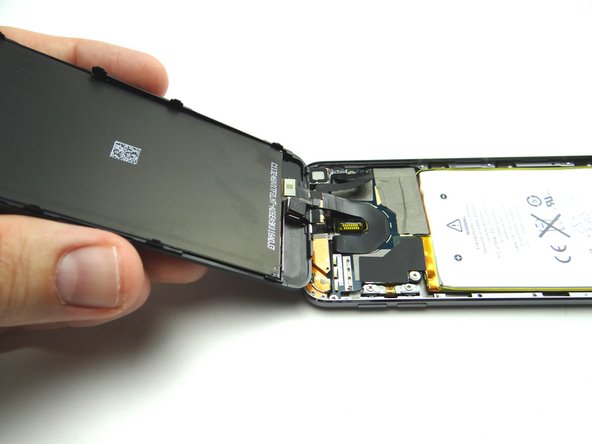 Picture 1: Once plate has been removed, you're able to fold back the front panel.