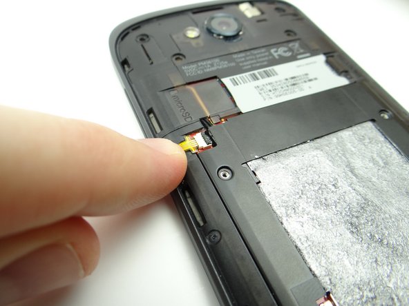 Picture 3: Close the ZIF connector to ensure it doesn't get disturbed/broken as you continue to disassemble the phone.