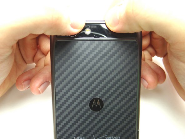 Pictures 2 &amp; 3: Press firmly along the top edge to secure the battery cover.