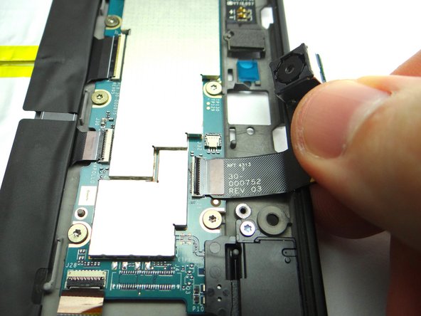 Pull rear camera free from open ZIF connector.  Place in COMPARTMENT E.