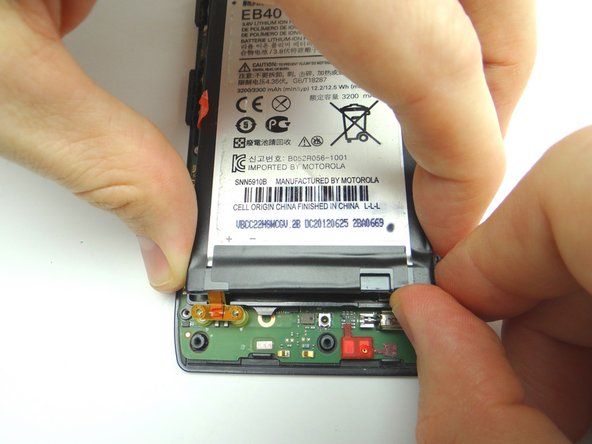 Picture 1: Retrieve battery from ZONE III. Place the battery into the metal chassis frame.