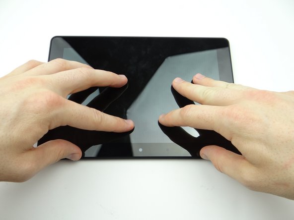 Picture 3: Press firmly on the display assembly to ensure all clips are seated correctly.