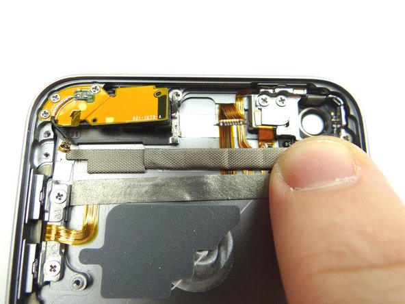 Use your fingers to place both tape rolls from COMPARTMENT C.