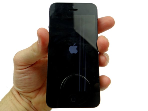 Picture 3: Power up the phone and don't close the front panel.  If the LCD or digitizer aren't working perfectly (white lines are the most common issue), jump back to Step 11.