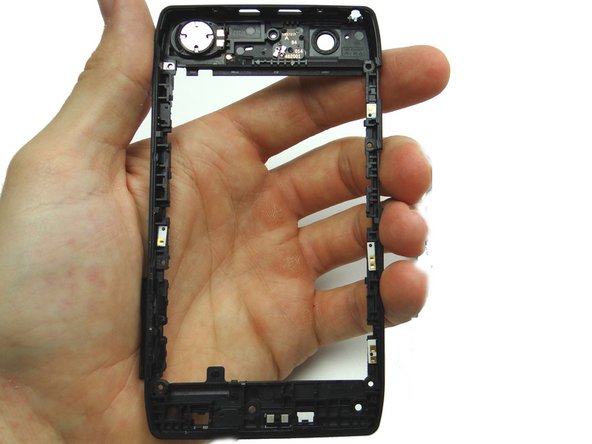 Seat the mid-frame from ZONE III on the display assembly.