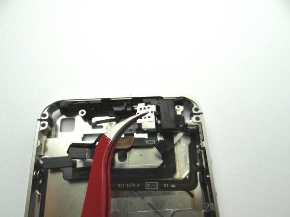 Remove front-facing camera plate and place in COMPARTMENT C.