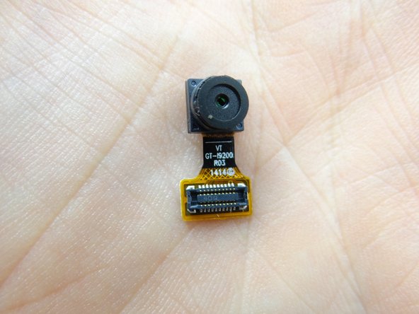 Pick up the camera with your fingers.  Place front-facing camera in COMPARTMENT C.