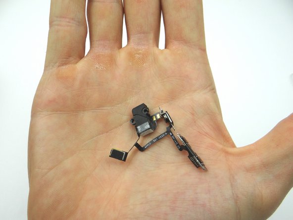 Picture 1 &amp; 2: Use Curved Tip Tweezers to remove the headset jack from the mid-frame. Pay careful attention to the ribbon cables still attached to the headset jack.