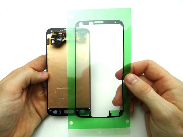 Cut adhesive in half so you can lay the top and bottom separately.