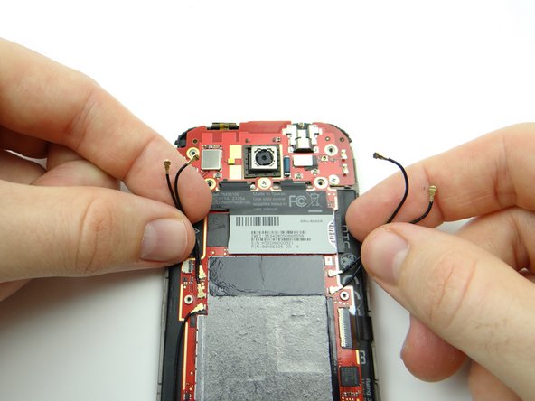 Picture 3: Gently bend the four cables away from the upper logic board.