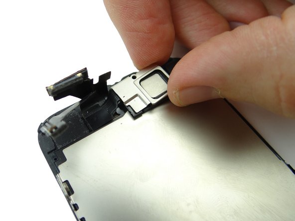 Picture 2: Replace the earpiece speaker bracket also in COMPARTMENT C.