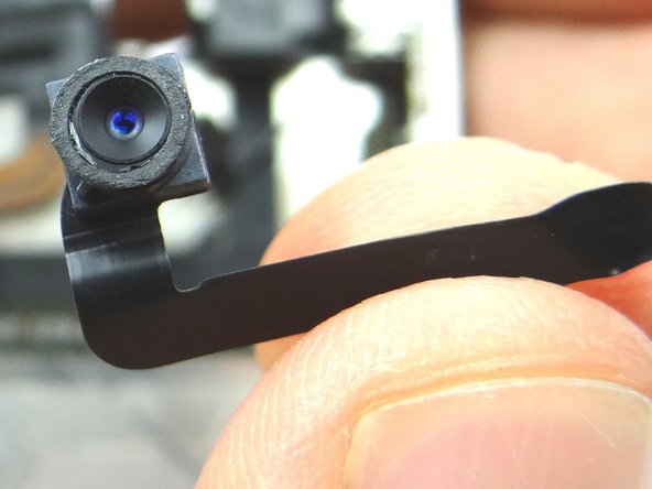 Pull the front-facing camera free from the iPhone. Place in COMPARTMENT D.