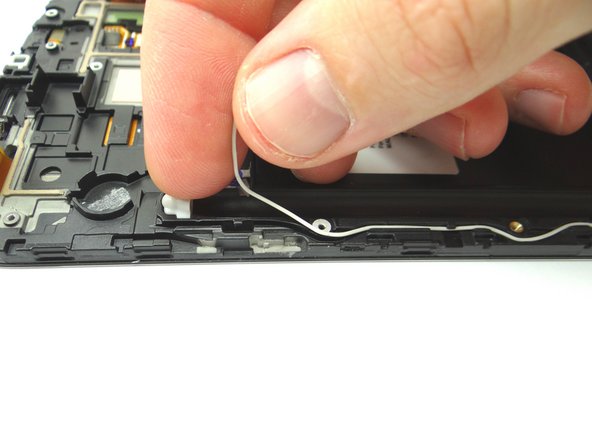 Route the WiFi antenna cable along the left side of the front assembly.