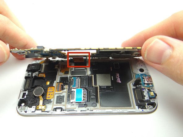 The display cable is still attached as shown in Picture 3.