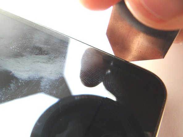 Picture 2: Insert iSesamo along the right edge, 1 inch from the bottom, at a 90 degree angle.