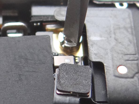Picture 2: Remove the Antenna Shield with your fingers or Fine Point Tweezers.  Place with the Phillips screw in SLOT 7.