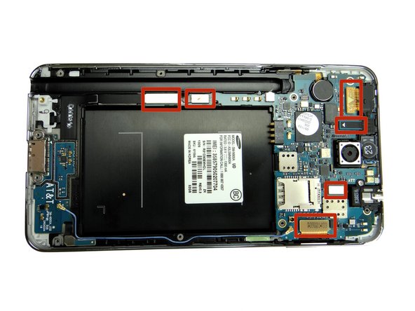 Use the Blue Pry Tool to disconnect six ribbon cable connectors on the logic board.