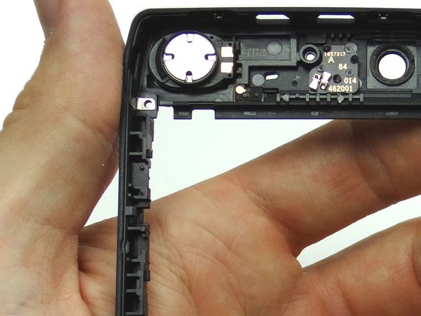 Seat it in the mid-frame as shown.