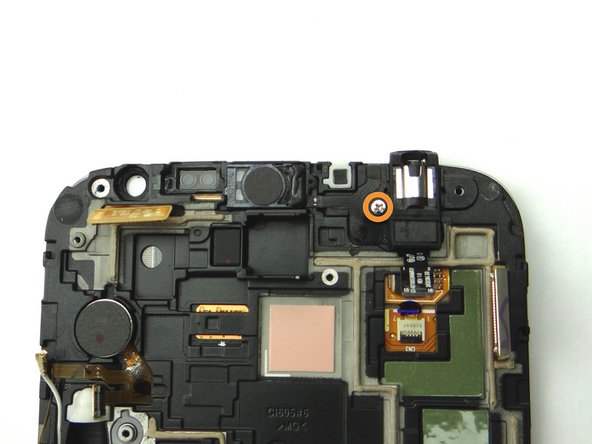 Remove one 2.9 mm Phillips screw and place into SLOT 4.