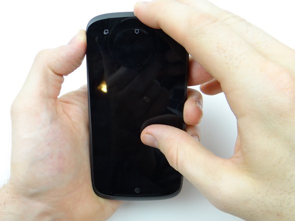 Work your way from bottom to top, snapping the front panel into place on the mid-body.  Snap the top edge (soft keys) into place.