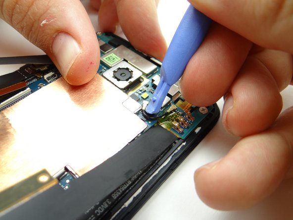 Picture 2: Disconnect right antenna from main board.