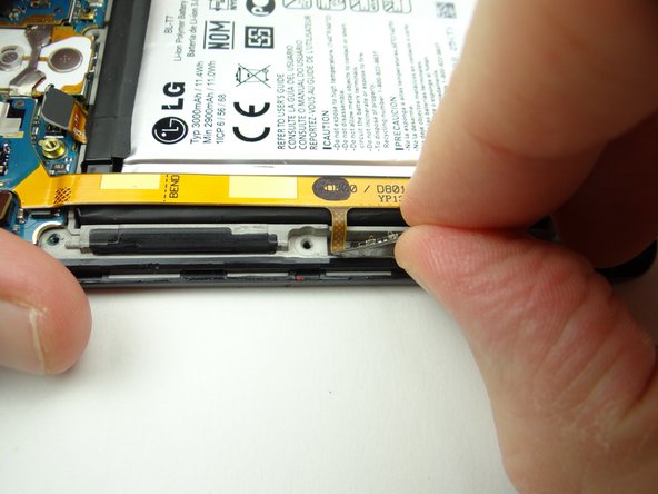 Lift the short board on the left side of the daughter board up and away from the mid-frame.