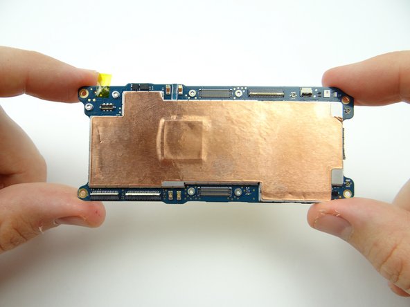 Place logic board in ZONE II.