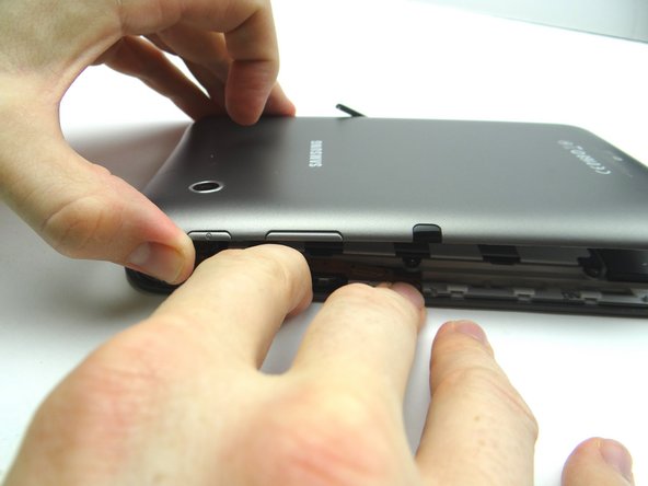 Picture 3: Make sure the power button and volume rocker seat properly and you push the sides into place.