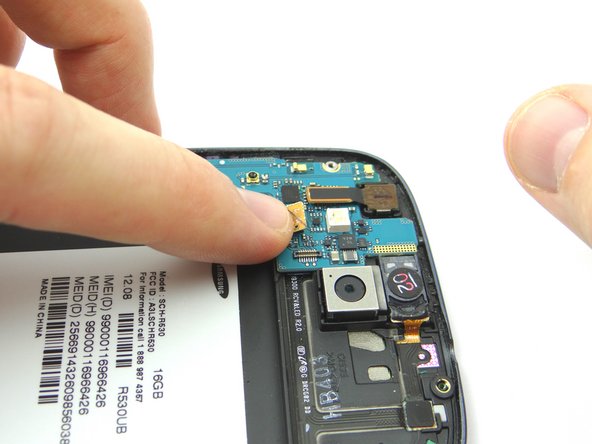 Picture 2: Reattach earpiece speaker/volume button cable connector.