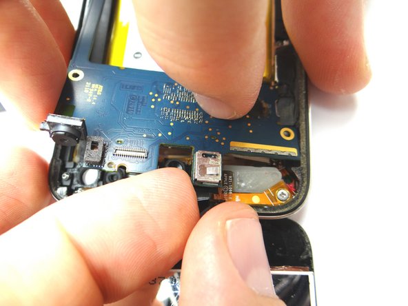 Picture 1: Align the digitizer ribbon connector with its socket on the underside of the logic board.