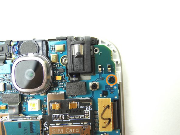 Picture 2: Remove one 2.4 mm Phillips screw and place into SLOT 2.