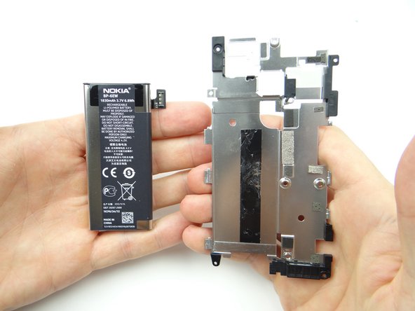 Place the battery and mid-plate on the anti-static foam.