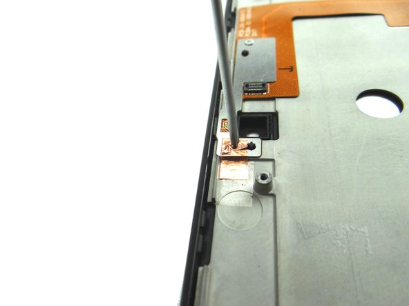 Pictures 2 &amp; 3: Remove two 3.2 mm #00 Phillips screws and place in SLOT 9.  The bottom screw is covered by copper tape - simply push the screwdriver through the tape.