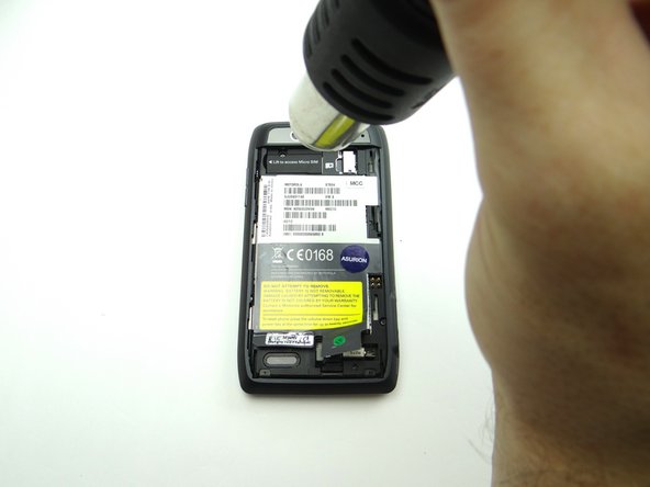 The battery is held in place with strong adhesive: