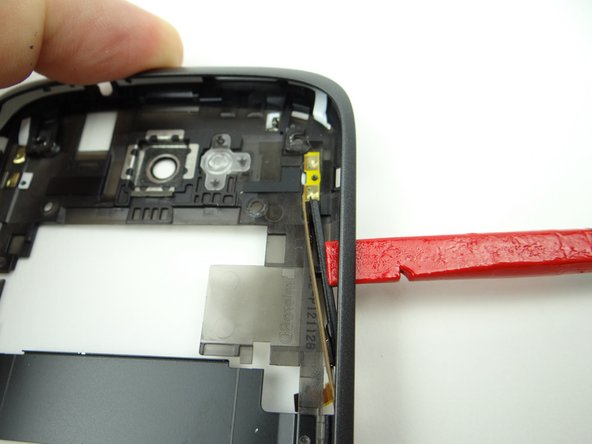 Place volume rocker and cable in COMPARTMENT D