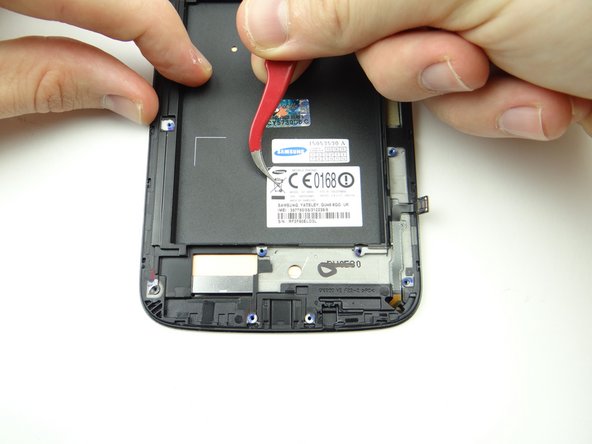 Picture 1: Heat the IMEI sticker with low-level heat for 30 seconds.  Heat the upper-left corner for an additional 10 seconds.