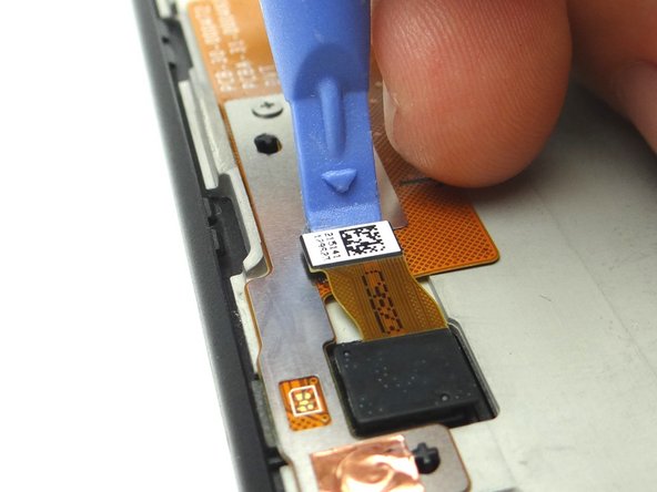 Use blue pry tool to disconnect the camera.