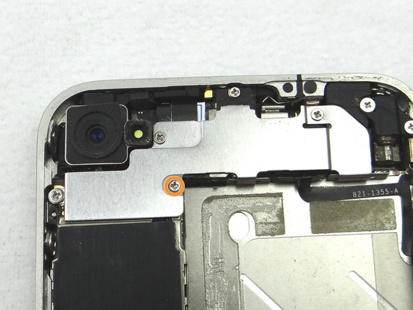 Picture 2: Remove the 1.4 mm Phillips screw and place in SLOT 4.