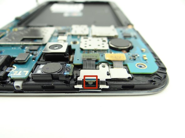 Picture 2: Avoid contact with the infrared sensor as you remove the shield covering the front camera &amp; speaker: