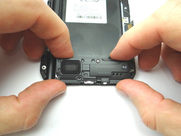 Use your fingers to remove the loudspeaker assembly and place into COMPARTMENT F.