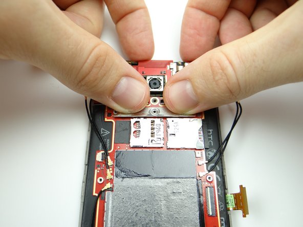 Seat silver upper logic board connector cable on main logic board.