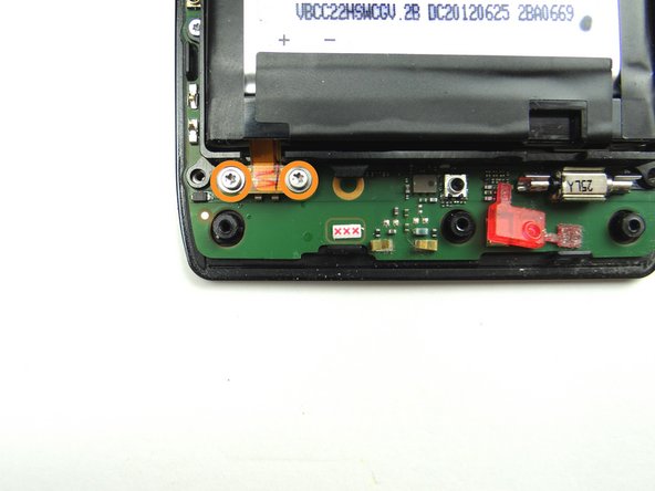 Picture 2: Remove two 3.3 mm T5 Torx screws and place into SLOT 5.