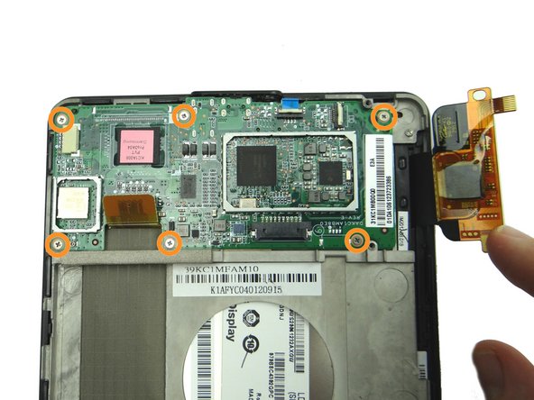 Picture 3: Remove six 2.6 mm Phillips screws securing the motherboard.  Place screws in SLOT 3.