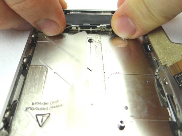 Picture 3: Replace the 2.4 mm Phillips screw from SLOT 12.