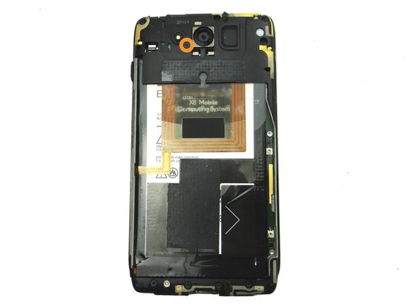 Picture 1: Remove 6.3 mm T3 Torx screw near the lower-left edge of the camera.  Place in SLOT 1.