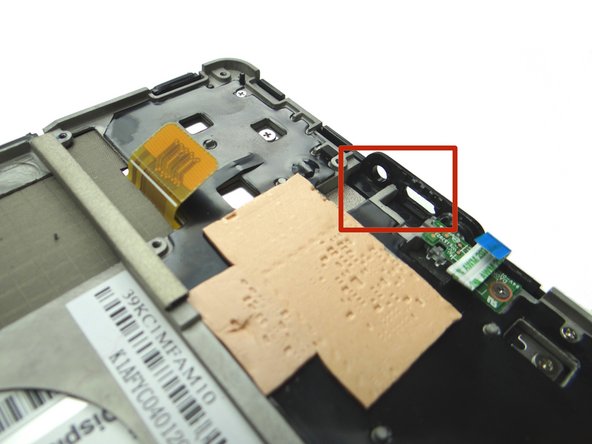 Picture 1: Shows the charging port and headset jack on the bottom of the logic board.