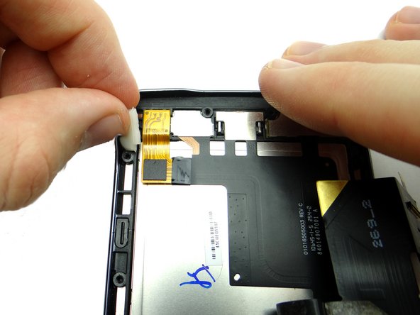 Remove the rubber gasket with your fingers and place it in COMPARTMENT D.